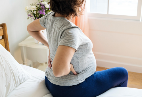 Sakit Pinggang Ciri Hamil Trimester Akhir, Kok Makin Pegal?